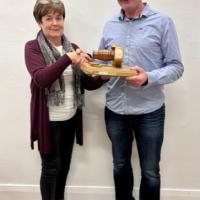 Patricia Donohue, Vice Chair Galway Camera Club, presenting "Most Improved Beginner of the year" to Anthony Mulahan